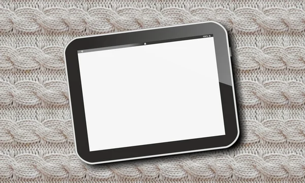 Tablet pc on wool pattern — Stock Photo, Image