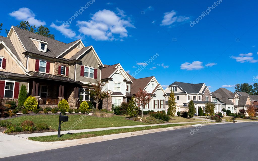 Street of large suburban homes – Stock Editorial Photo © kzlobastov  #34698097