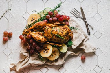 duck poached for thanksgiving with grapes, quince, rosemary and thyme