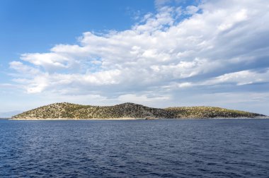 Small island Thassopoula near to Thassos in north Aegean sea Gre clipart