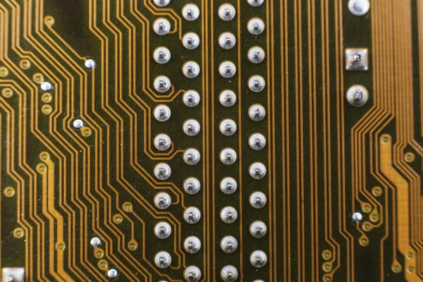 Yellow computer circuit board — Stockfoto