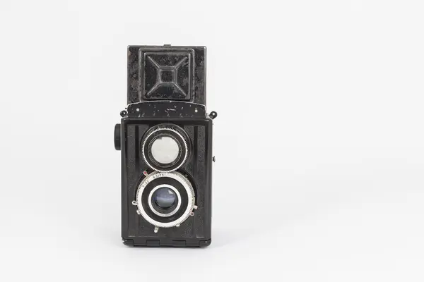 Vintage old photographic twin lens camera — стоковое фото