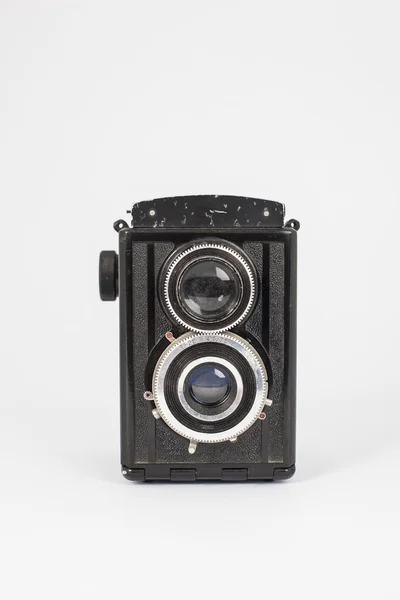 Vintage old photographic twin lens camera — стоковое фото