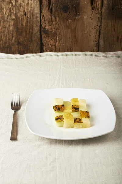 Mediterrane Küche, Melone in Würfeln. — Stockfoto