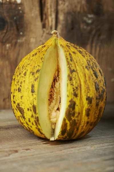 Fresh melon on a wooden table — Stock Photo, Image