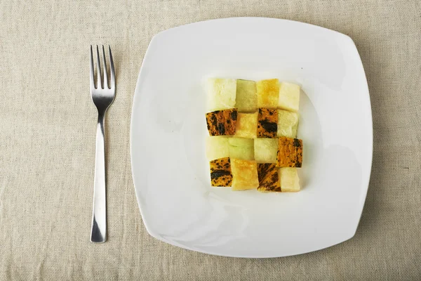 Mediterrane Küche, Melone in Würfeln. — Stockfoto