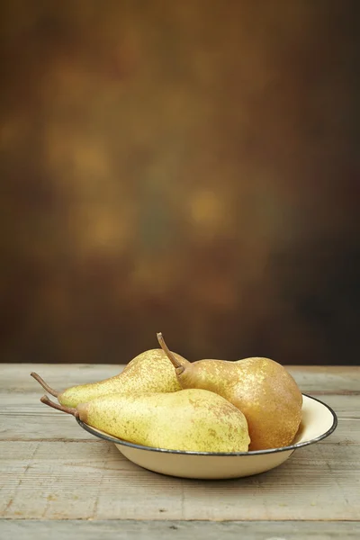 Pears in a plate — Stock Photo, Image