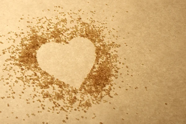 Valentines Day, heart made of brawn sugar — Stock Photo, Image