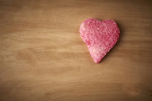 Red colored heart shape of bread — Stock Photo, Image