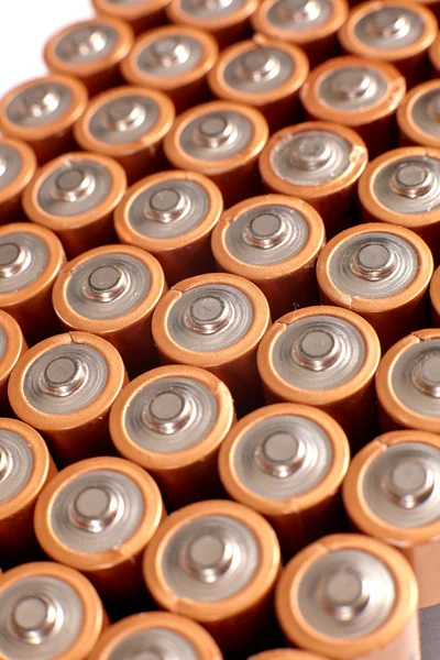Gold batteries in rows — Stock Photo, Image