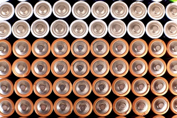 Gold batteries in rows — Stock Photo, Image