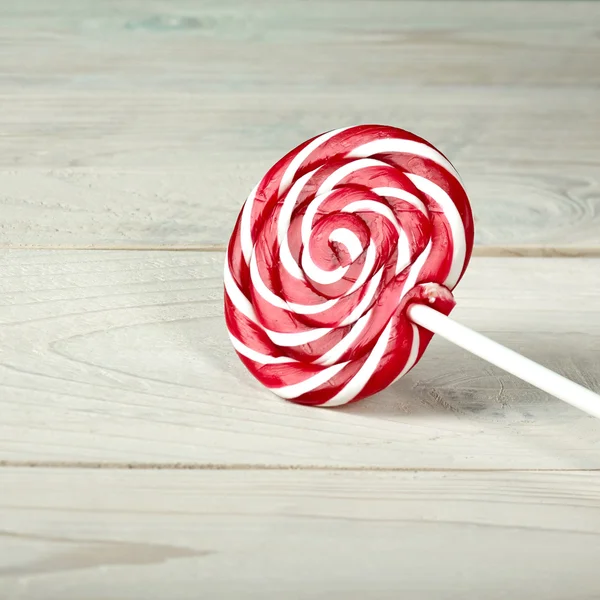 Large spiral lollipop on stick — Stock Photo, Image