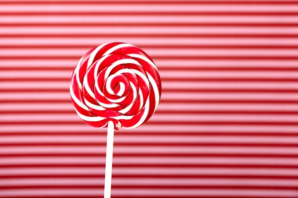 Large spiral lollipop on stick — Stock Photo, Image