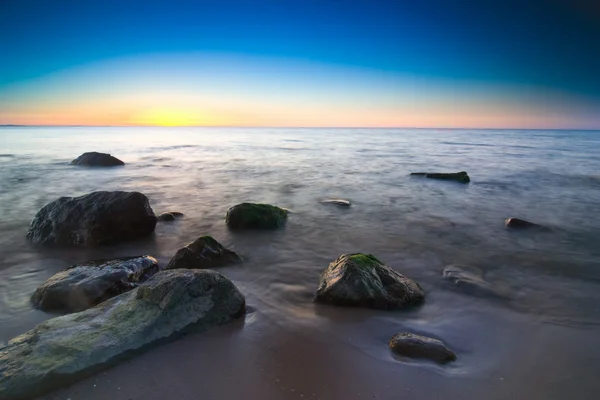 Sunset on the beach — Stock Photo, Image