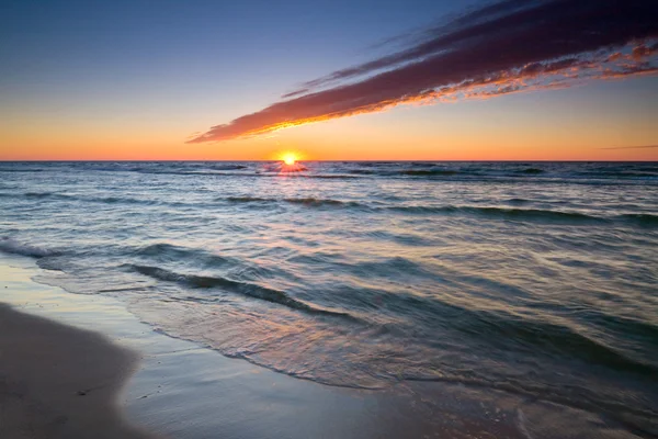 Sunset on the beach — Stock Photo, Image