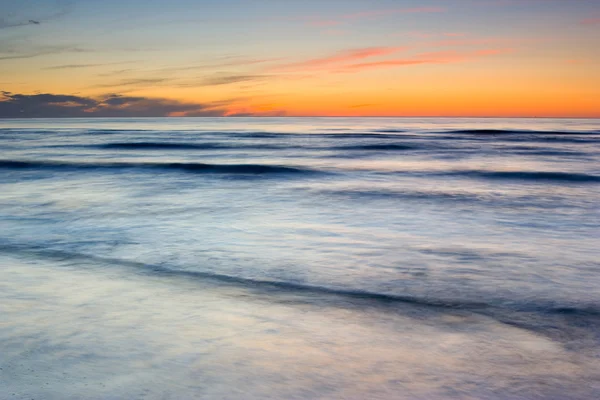 Sunset on the beach — Stock Photo, Image