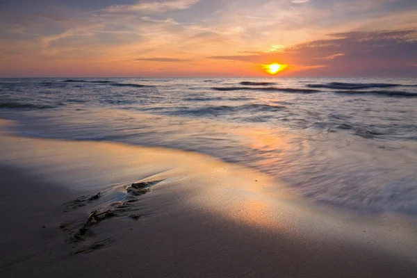 Sunset on the beach — Stock Photo, Image