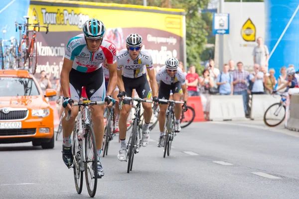 Cracovia, POLONIA - 6 de agosto: Ciclistas en la etapa 7 del Tour de Pologne el 6 de agosto de 2011 en Cracovia, Polonia. TdP forma parte del prestigioso UCI World Tour . — Foto de Stock