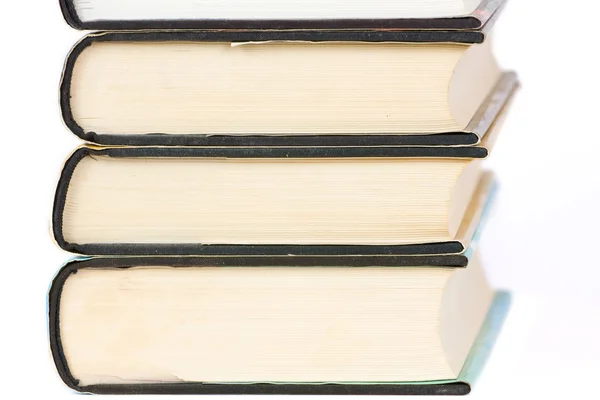 Pila di libri antichi isolati su bianco — Foto Stock