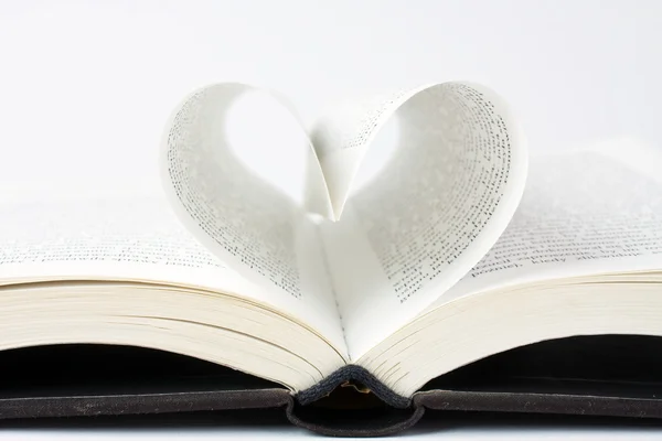 Book with pages folded into a heart shape Royalty Free Stock Images