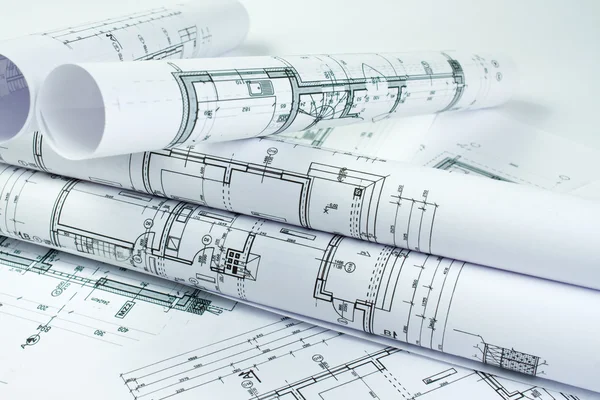 Architect rolls and house plans — Stock Photo, Image