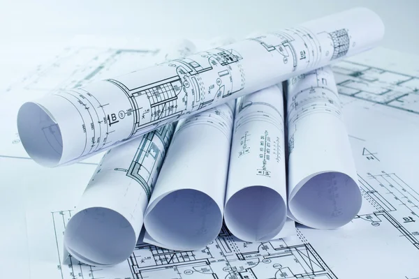 Architect rolls and house plans — Stock Photo, Image