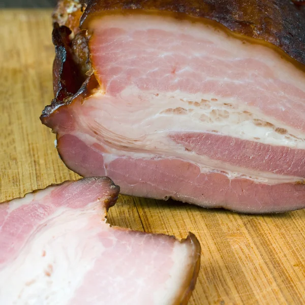 Carne de porco embrulhada em bacon — Fotografia de Stock