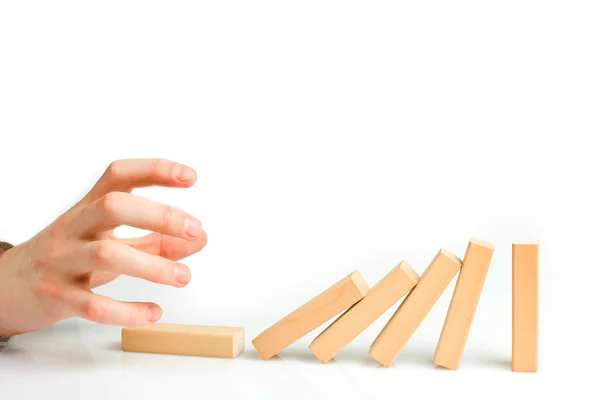 Concept for solution to a problem by stopping the domino effect — Stock Photo, Image