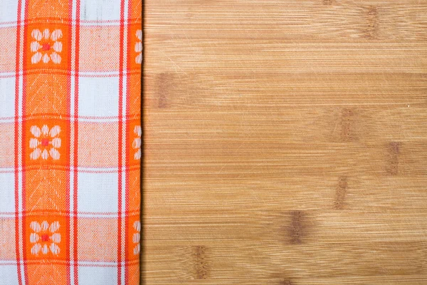 Tischdecke auf Holztischhintergrund — Stockfoto