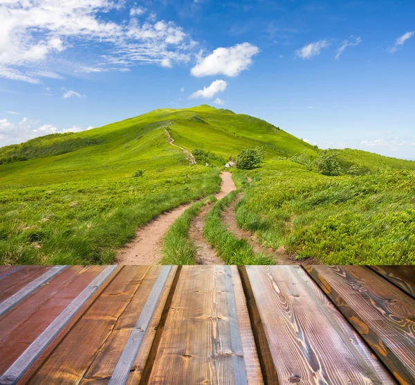 Mountains landscape with wooden planks — Stock Photo, Image