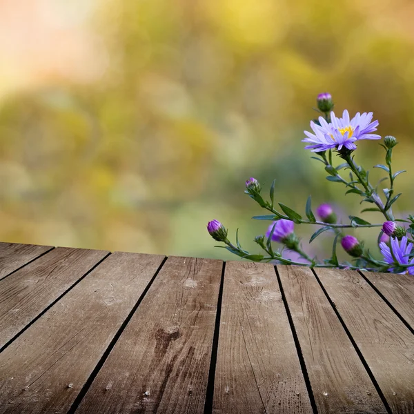 Autumn theme and empty wooden deck table. Ready for product montage display — Stock Photo, Image
