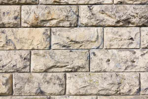 Textura de una pared de piedra marrón . — Foto de Stock