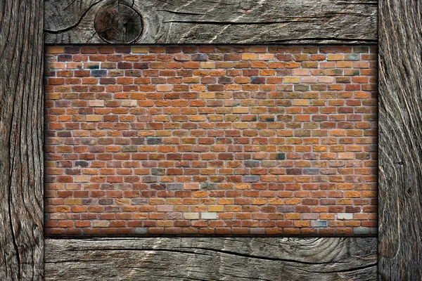 Bakstenen muur en houten frame — Stockfoto