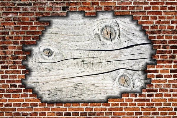 Gebroken muur met hout achtergrond — Stockfoto