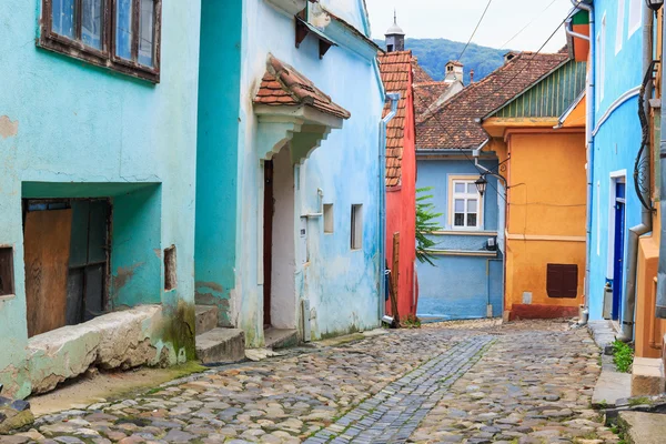 Medieval street view in Sighisoara founded by saxon colonists in — Stock Photo, Image