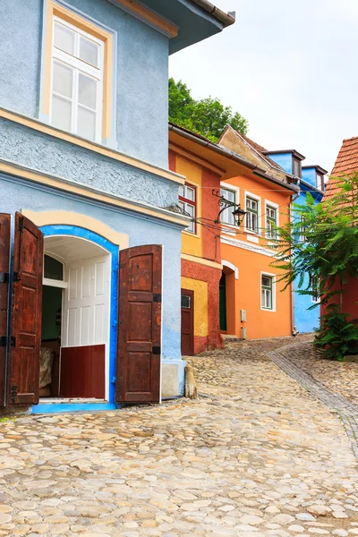 Medieval street view in Sighisoara founded by saxon colonists in — Stock Photo, Image