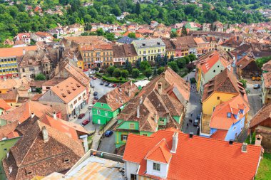 SIGHISOARA, ROMANIA - JULY 17: Aerial view of Old Town in Sighisoara, major tourist attraction on July 17, 2014. City in which was born Vlad Tepes, Dracula clipart