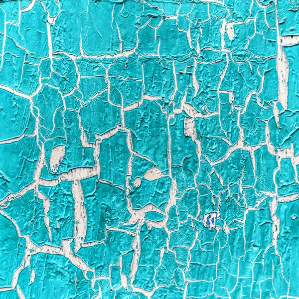 Cracked paint on the concrete wall — Stock Photo, Image