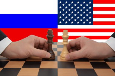 US-Russia Summit expressed in a chess game. clipart