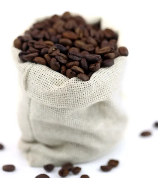 Coffee beans in canvas sack — Stock Photo, Image