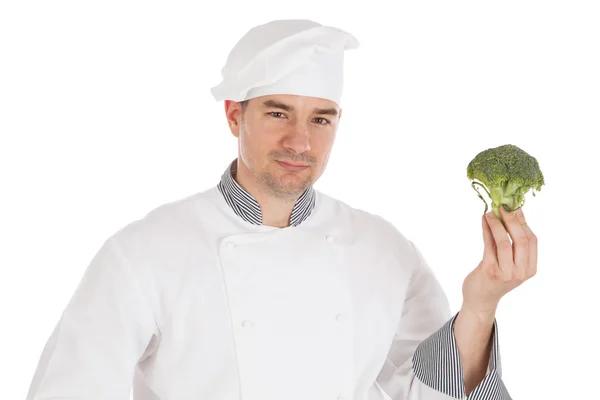 Šéfkuchař hospodářství čerstvou brokolicí — Stock fotografie
