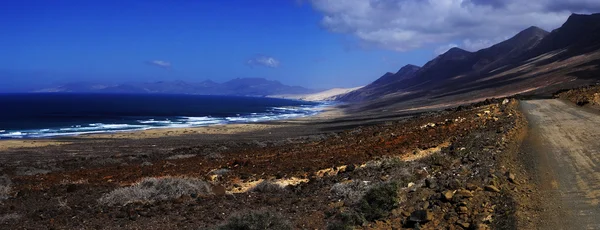 Plaża Cofete i wulkaniczne góry widok na Półwysep jandia, fu — Zdjęcie stockowe