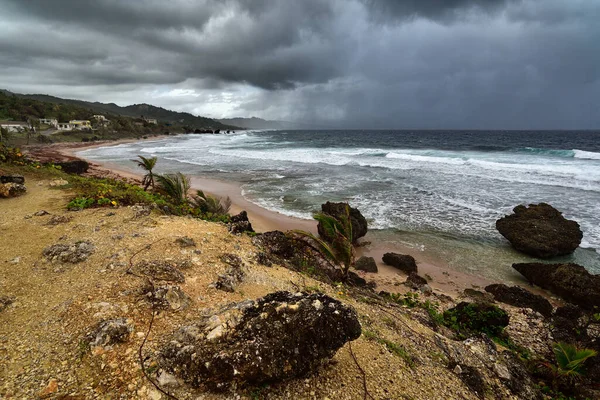 Stormy weather above famous rocks formation on the beach of Bathsheba, East coast of island Barbados, Caribbean Islands