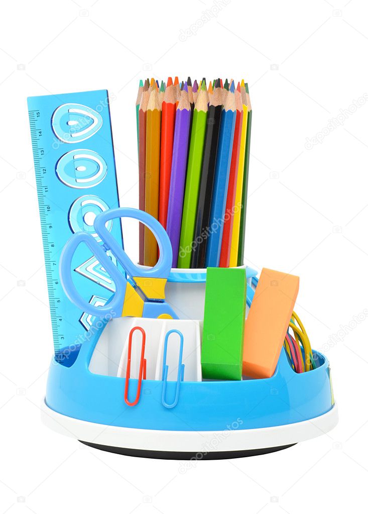 Pencil holder with a rule, scissors, erasers and many-colored pe