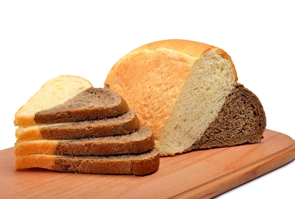 Fresh heart shaped bread on the wooden board — Stock Photo, Image