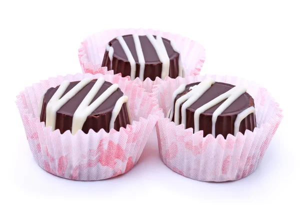 Três doces de chocolate — Fotografia de Stock