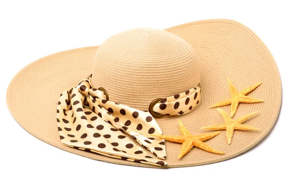 Vrouw strand hoed met zeesterren — Stockfoto