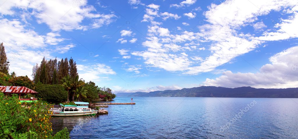 Boat and Lake Toba Panorama.