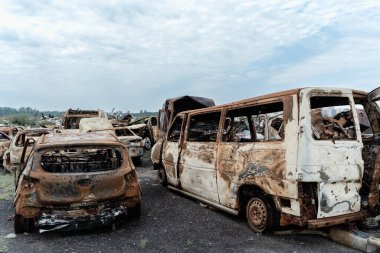 Mangled car bodies after destruction by Russian artillery in Ukraine, Bucha
