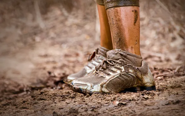 Runner's muddy feet — Stock Photo, Image